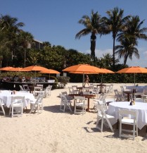 beach event set up tables and umbrellas sundial