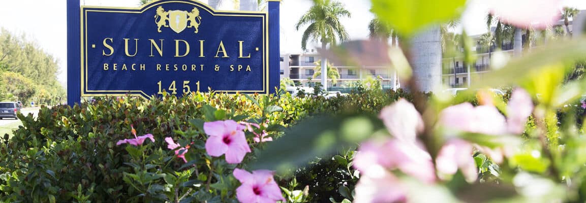 Sundial Beach Resort Spa entrance sign and landscaping