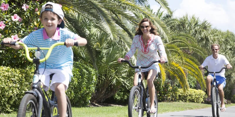 Family enjoying bike ride sanibel island bike trails