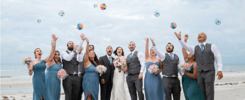 group wedding shot beachball toss sanibel sundial