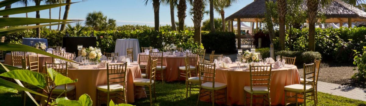 outdoor reception set up wedding sundial sanibel tropical greenery