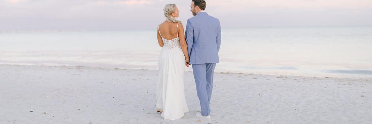 wedding portrait couple on beach pale colors sanibel island sundial