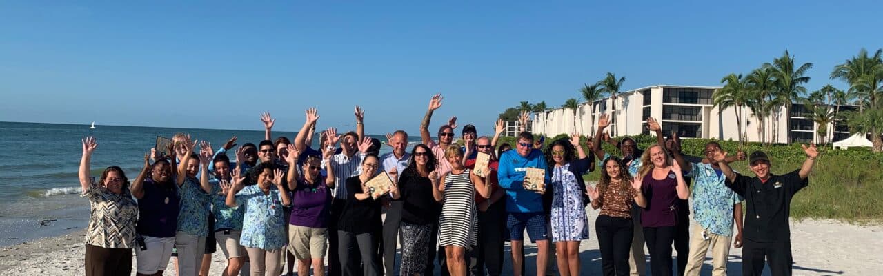 best of the islands 2019 sundial group staff photo on beach