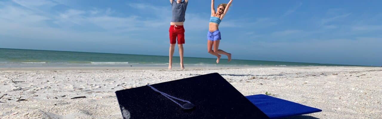 2020 graduate jumping for joy sanibel island beach sundial