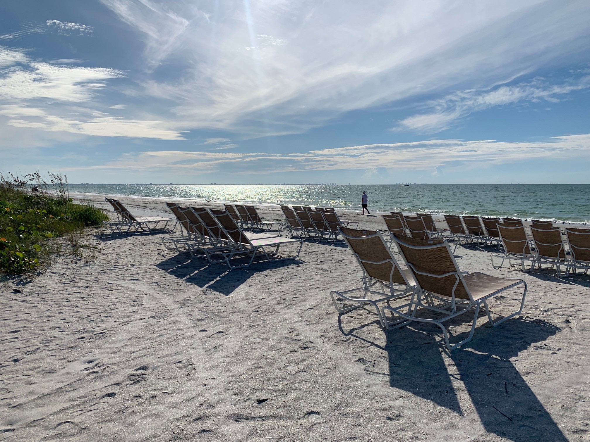 socially distant beach chairs sanibel island sundial