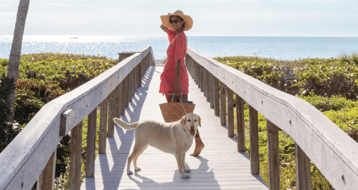 southern living souths best 2021 cover shoot at sundial woman beach path dog sanibel island