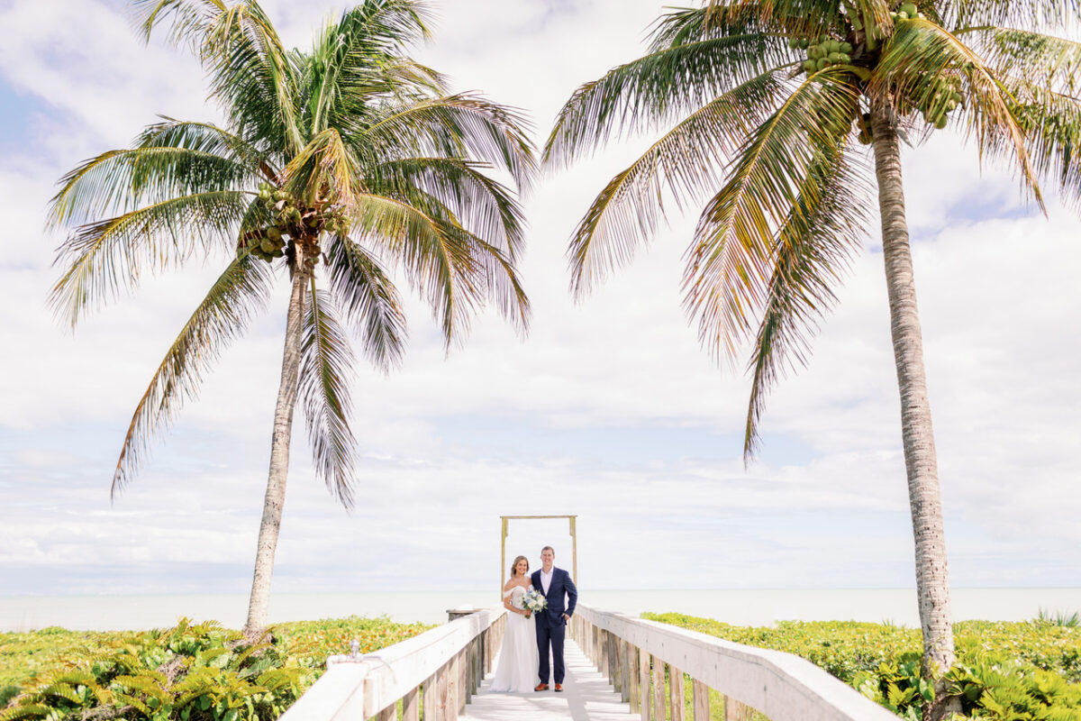 sam and matt wedding beach couple walkway arch portrait sundial sanibel 2022