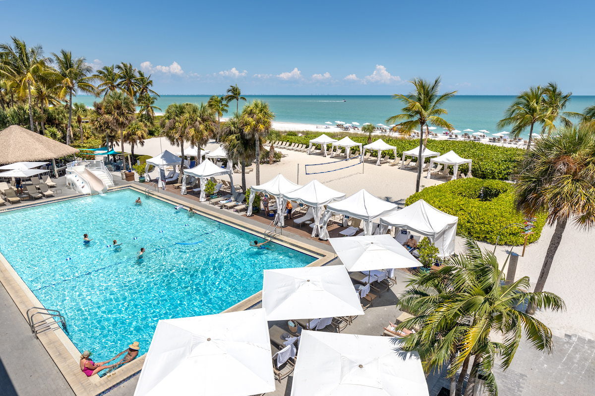 sundial resort pool shot from balcony beach in background sanibel gulf of mexico