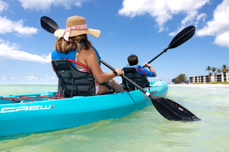 mother and sun kayaking on gulf