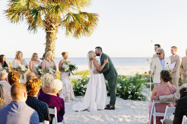 Libby and spencer wedding sanibel sundial beach front ceremony set up first kiss