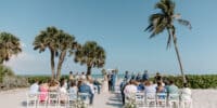 Jenna + Joseph's Wedding at Sundial resort taylor shea photo beach ceremony couple at altar