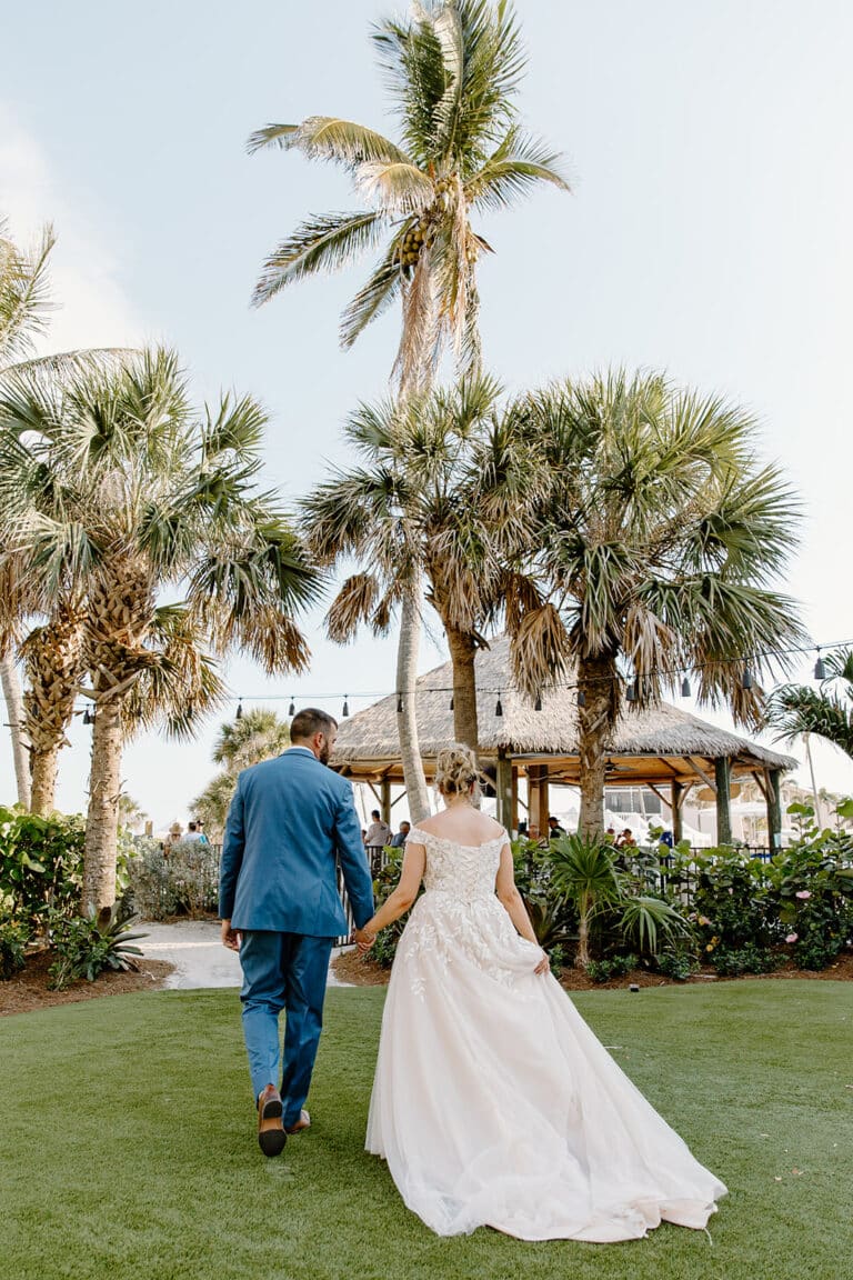 Jenna + Joseph's Wedding at Sundial resort taylor shea photo couple hand in hand walking away from comera