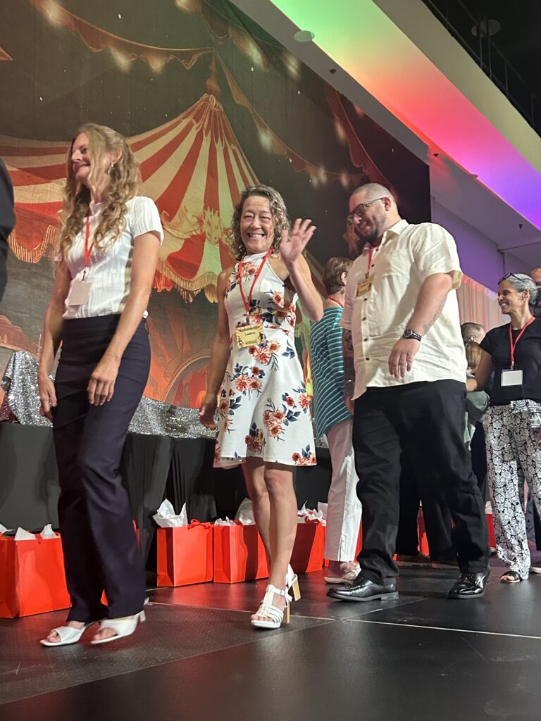 2025 E Awards for Lee County CVB stage antoinette with other nominess