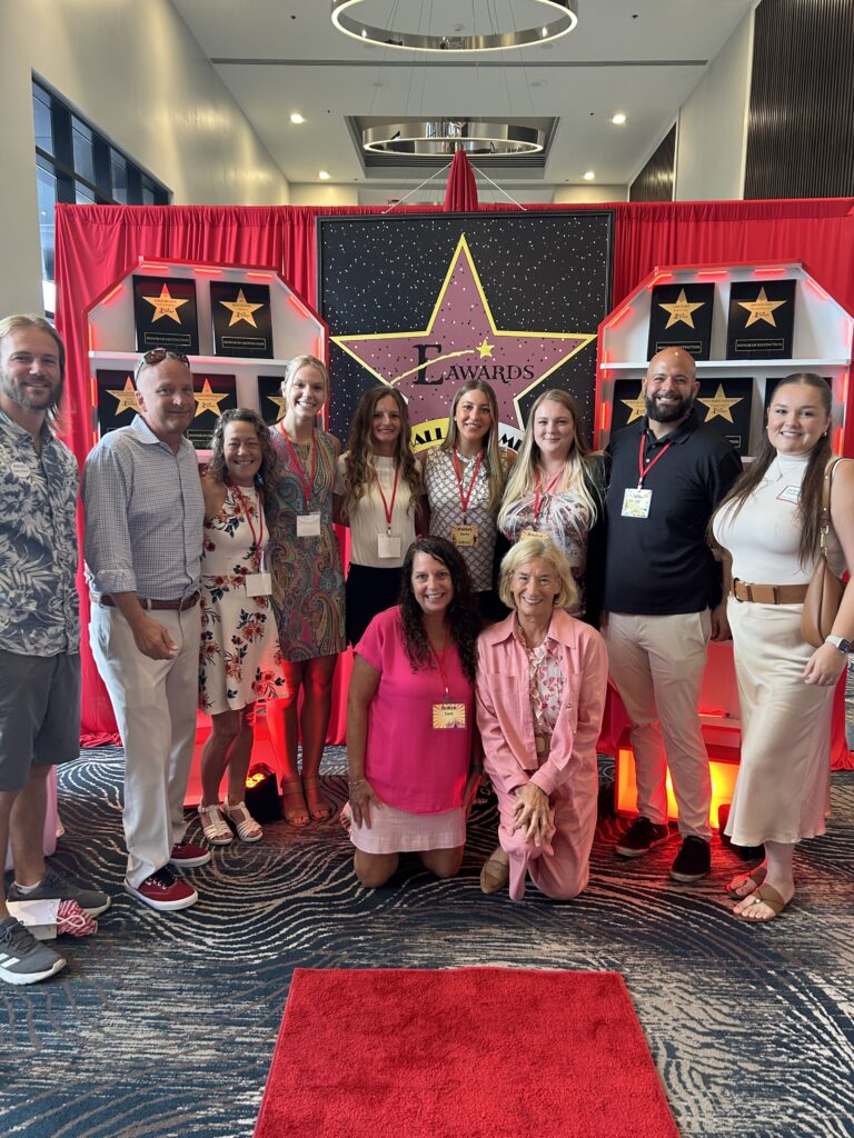 2025 E Awards for Lee County CVB Sundial nominees posing in front of awards