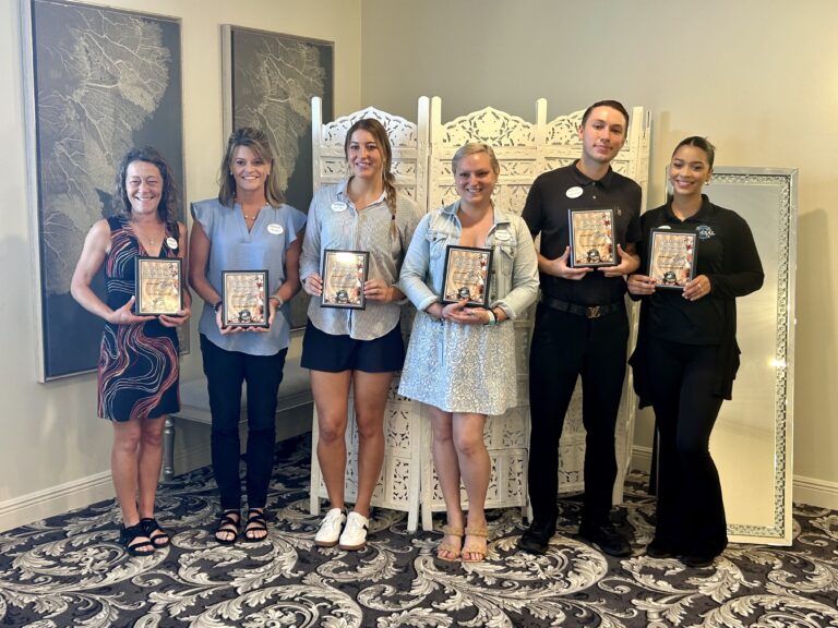 2025 best of the islands awards ceremony at sundial resort on sanibel island where staff is holding sundial's 6 awards