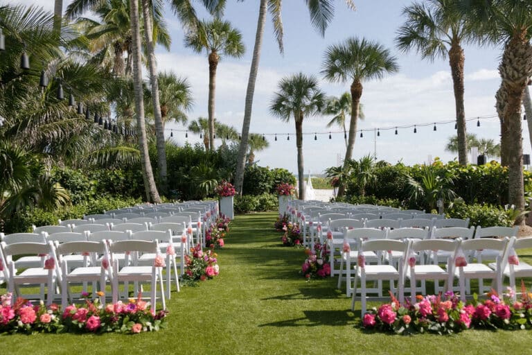 Maddie Briggs Photography ceremony set up with aisle and altar hibiscus lawn with wedding party at sundial resort sanibel island