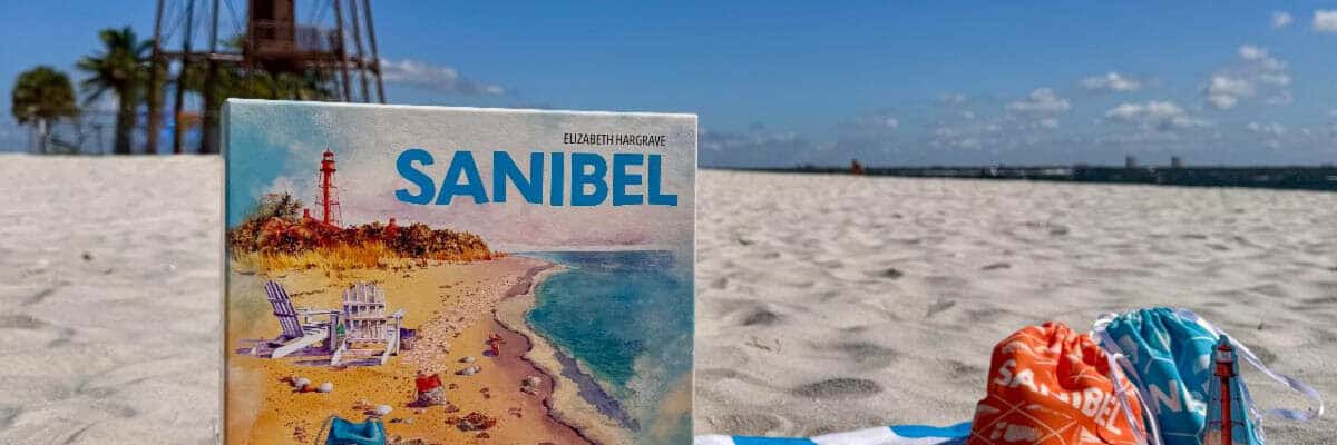 new sanibel board game in front of sanibel lighthouse