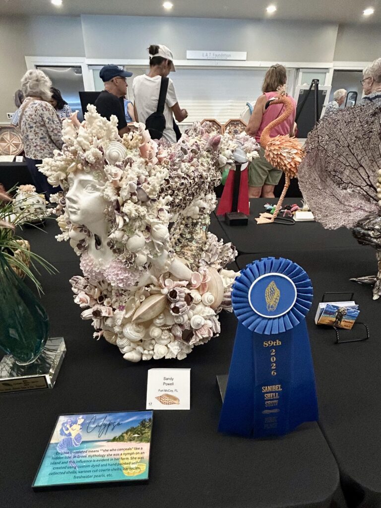 2026 sanibel shell show display of shell and sea life encrusted mermaid statue view 1