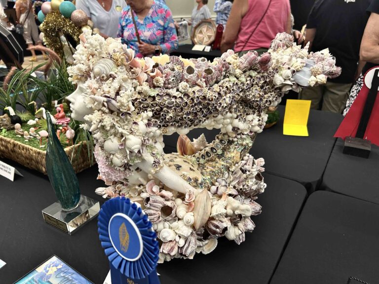 2026 sanibel shell show display of shell and sea life encrusted mermaid statue view 2