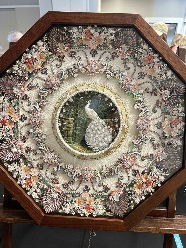 2026 sanibel shell show display of sailors valentine feature albino peacock centerpiece made of shells