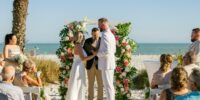 Austin and Kelsey’s wedding photo by Complete Wedding and Events Fort Myers wedding ceremony bride and groom at the altar v2