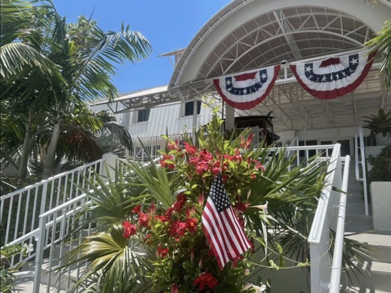 sundial resort entrance close up showing flag and patriotic bunting