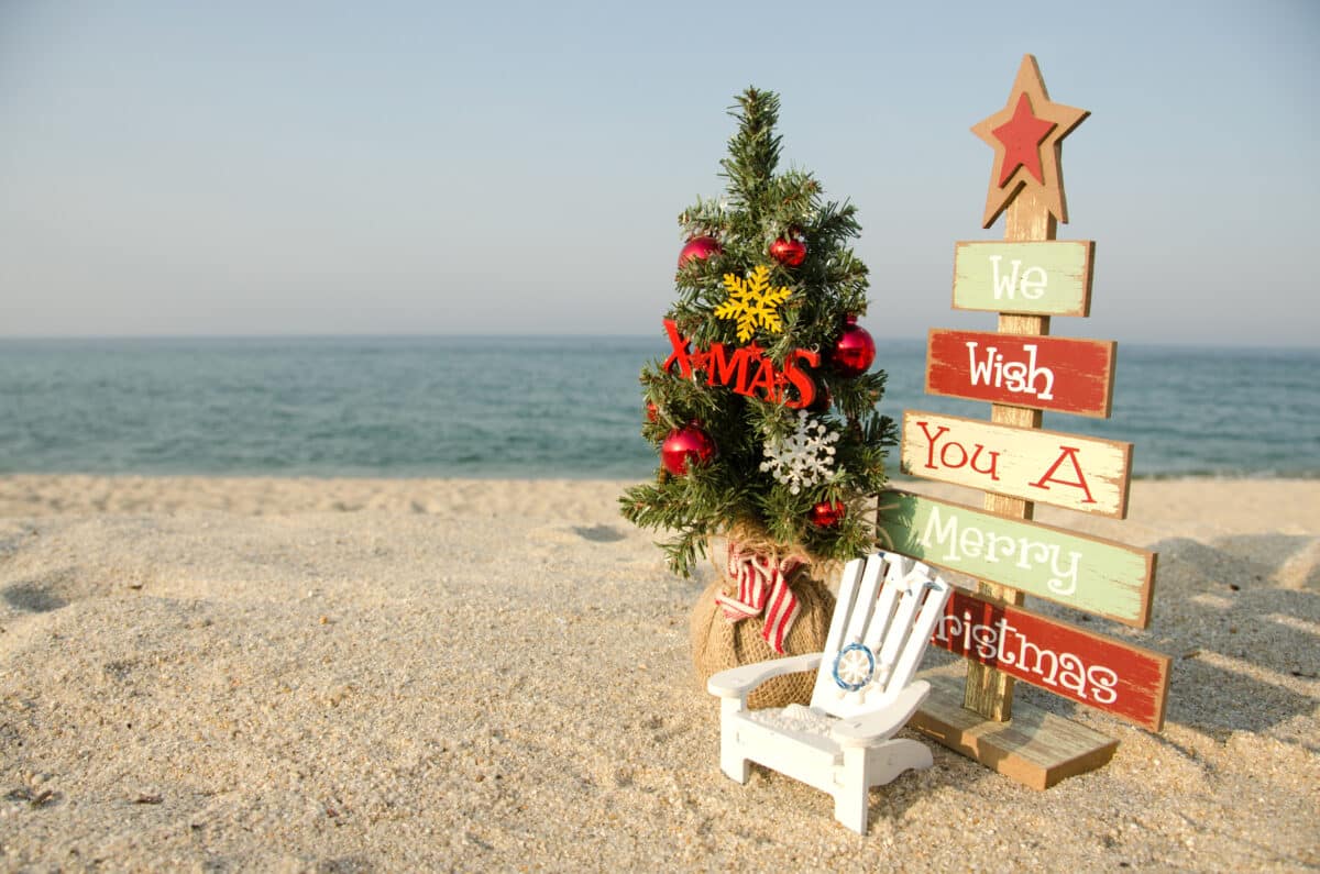 christmas tree and decor set up on beach