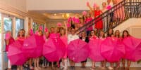 group photo at first little pink dress event with sancap pink foundation